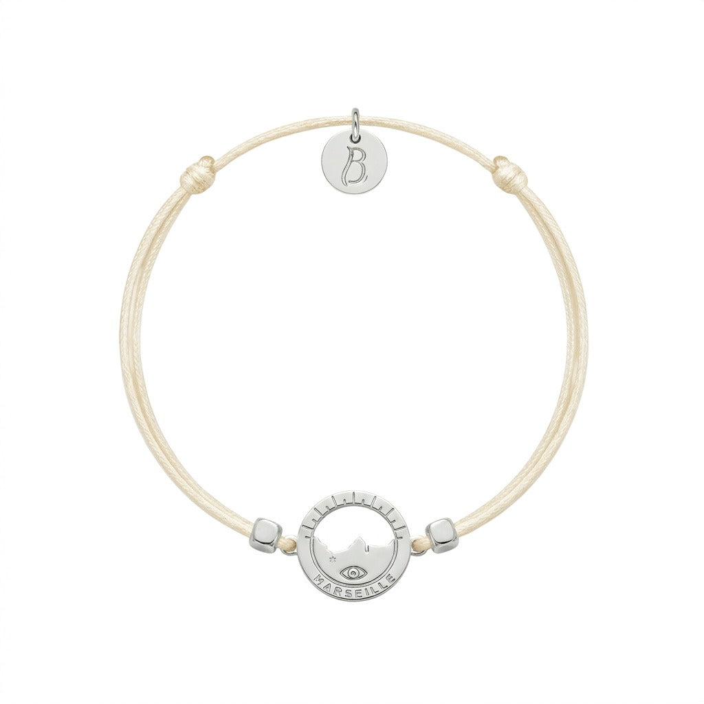 bracelet Les Catalans cordon nylon argenté écru — médaille Marseille ajourée, bijou plaqué argent Ligne Bleue