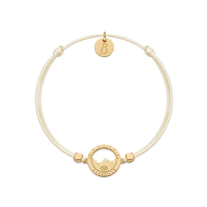 bracelet Les Catalans cordon nylon doré écru — médaille Marseille ajourée, bijou doré à l'or fin Ligne Bleue