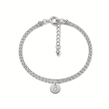 Bracelet Endoume en plaqué argent 10 microns, maille plate à décor dentelle portée en double rang, médaillon au monogramme LB — Ligne Bleue, Marseille