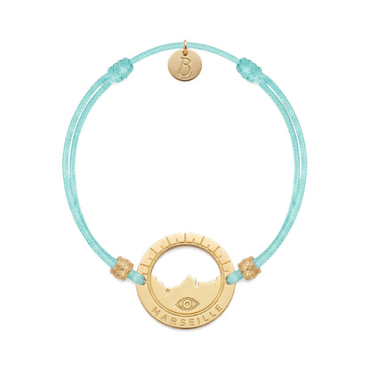 bracelet Pointe Rouge cordon doré bleu lagon — médaille Marseille ajourée, bijou doré à l'or fin Ligne Bleue