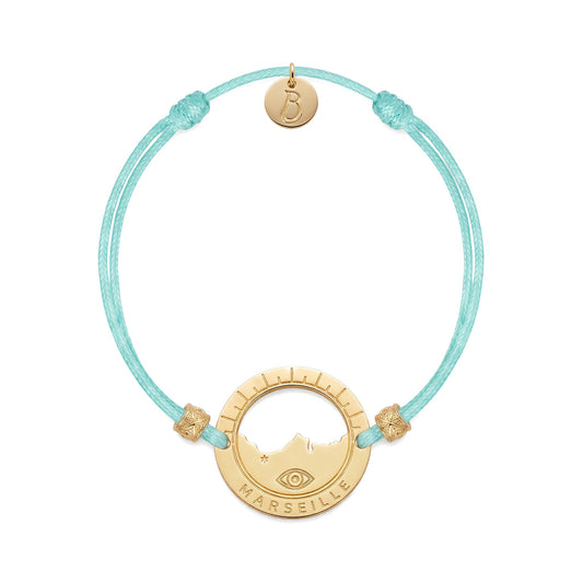bracelet Pointe Rouge cordon doré bleu lagon — médaille Marseille ajourée, bijou doré à l'or fin Ligne Bleue